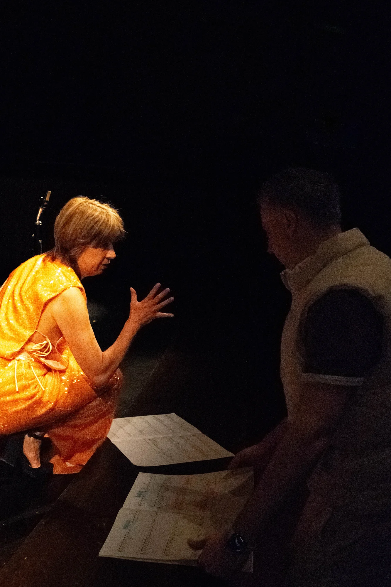 Discussing the score during rehearsal